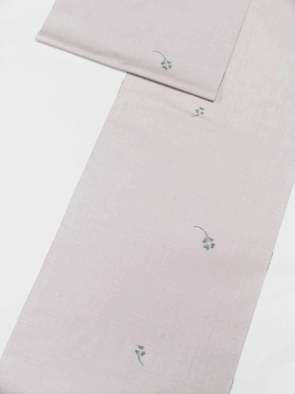 越後真綿紬（手擦り込み絣：淡赤紫鼠：光風）